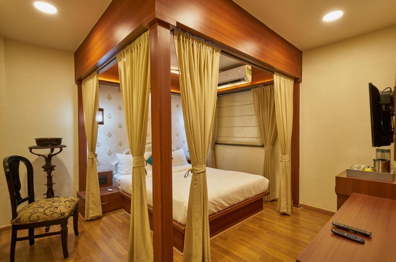 Tranquil La Casa Hotel Pune Phòng bức ảnh
